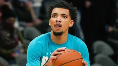 James Bouknight shoots during warmups