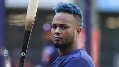 Martin Maldonado prepares for batting practice