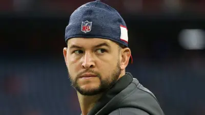 AJ McCarron looking on