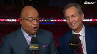 Cris Collinsworth next to Mike Tirico