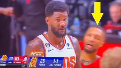 Damian Lillard talks to Deandre Ayton