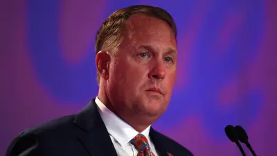 Hugh Freeze at a press conference