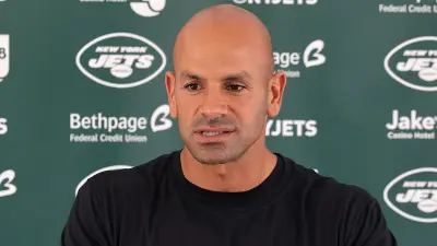 Robert Saleh talks with the media
