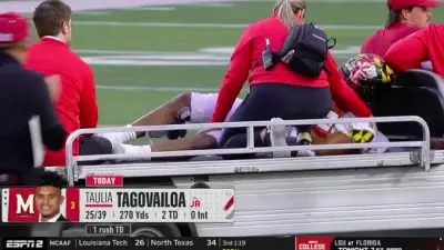 Taulia Tagovailoa on a cart