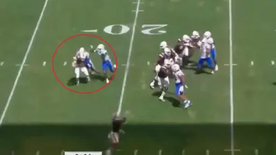 Tyler Van Dyke tackled