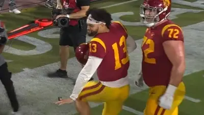 Caleb Williams does a Heisman pose