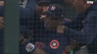 Dusty Baker celebrating in the dugout