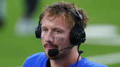 John Wolford with a headset on