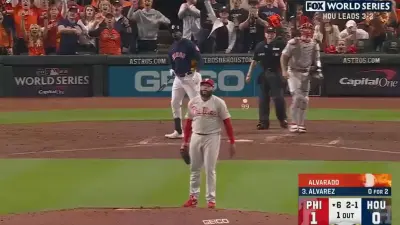 Yordan Alvarez poses after a hit