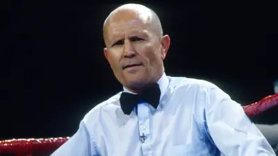 Mills Lane working a boxing match