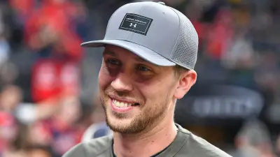 Nick Foles attends a basketball game