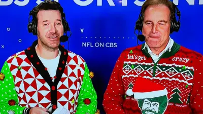 Jim Nantz and Tony Romo in Christmas sweaters