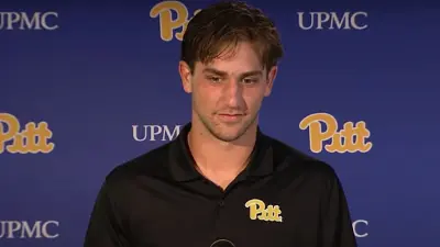 Kedon Slovis talks with the media