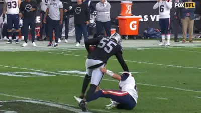 Chandler Jones stiffarms Mac Jones