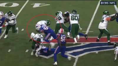 Mike White being hit in the ribs