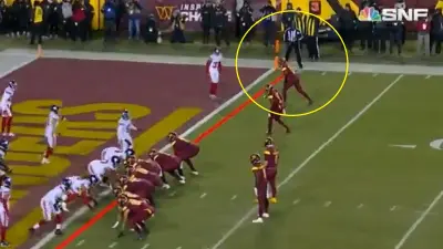 Terry McLaurin checks with the ref