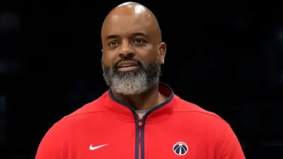 Wizards coach Wes Unseld Jr. looking on