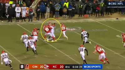 A Bengals player being blocked