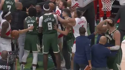 Bucks and Raptors players gather