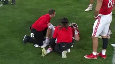 Cam Rising on the ground