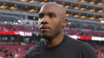 DeMeco Ryans on the field after a game