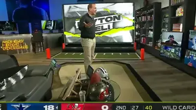 Peyton Manning standing up