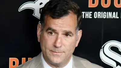 Rick Hahn looking on