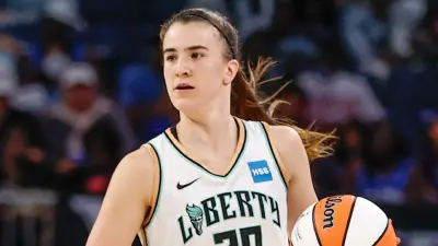 Sabrina Ionescu handling the basketball