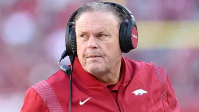Sam Pittman with a headset