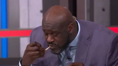 Shaq eating frog legs