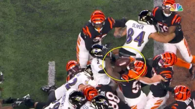 Tyler Huntley loses a ball