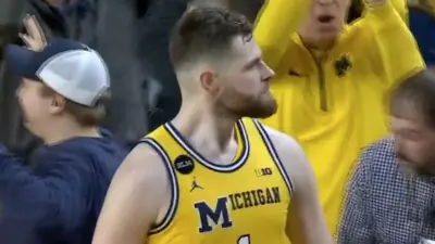 Hunter Dickinson drains a three at the buzzer