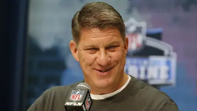 Jason Licht at a press conference
