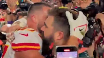 Jason and Travis Kelce hug after the Super Bowl