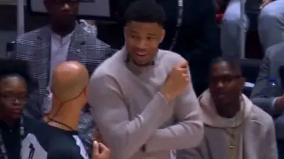 Giannis Antetokounmpo talking to Richard Jefferson