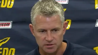 Jason Candle talks with the media