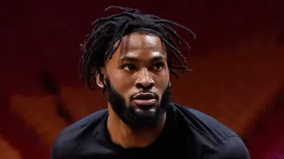 Justise Winslow looking on