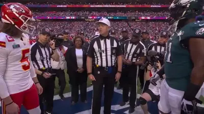 A look at the opening coin toss