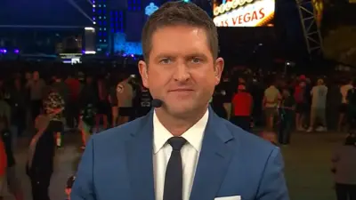 Todd McShay wearing a suit