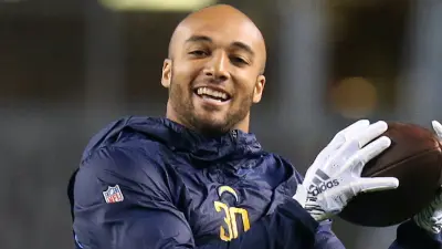 Austin Ekeler catches a pass in warmups