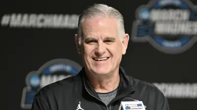 Brian Dutcher at a press conference