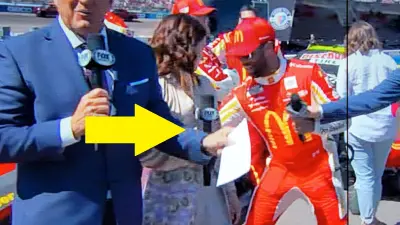 bubba Wallace next to danica Patrick