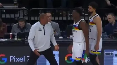 Doc Rivers talks with Anthony Edwards