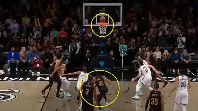Donovan Mitchell committing a lane violation
