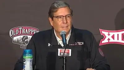 Mark Adams talks with the media