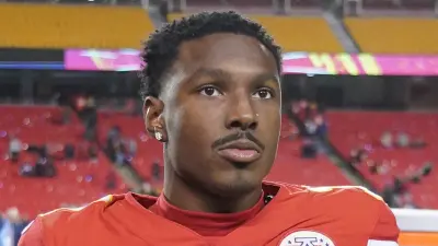Mecole Hardman looking on