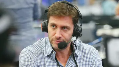 Mike Greenberg wearing a headset
