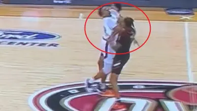 A SIUE player throws a punch
