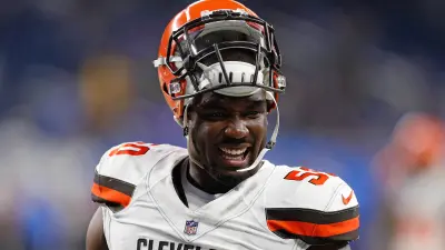 Chris Smith smiles on the field
