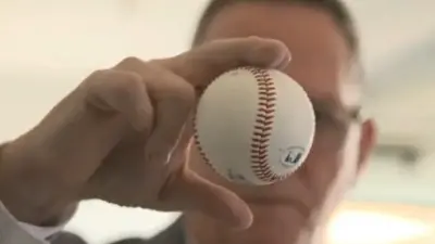 David Cone holds a ball